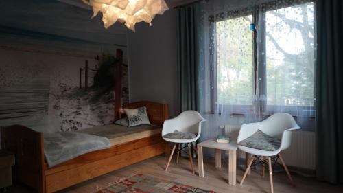 Ένα ή περισσότερα κρεβάτια σε δωμάτιο στο Apartament "Przy Molo" Międzyzdroje
