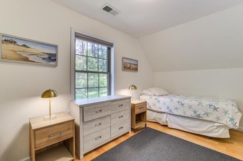 Un dormitorio con una cama y una cómoda y una ventana. en Pet-Friendly Lebanon House with Lake Access!, en Lebanon