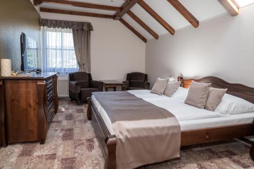 Postel nebo postele na pokoji v ubytování Villa Žerotín Penzion Bed & Breakfast