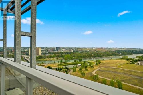 a view of a river from a balcony at InfinityNest Chic downtown escape stunning views in Calgary