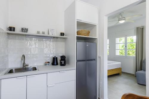 Η κουζίνα ή μικρή κουζίνα στο The Botanist Guesthouse