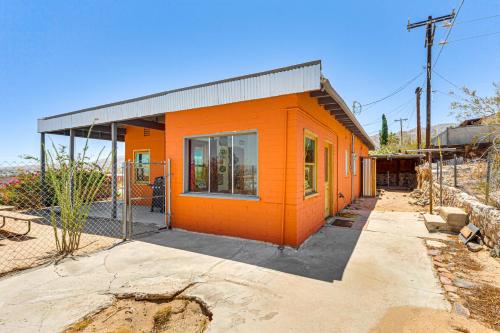 an orange house is under construction on a street at 5 Mi to Joshua Tree National Park Desert Oasis! in Twentynine Palms