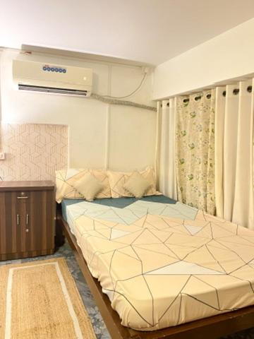 Cama o camas de una habitación en GOAROUND- Cozy Casa Mellow at Vagator by Goaround Homes
