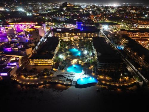 an aerial view of a city at night at GR Solaris Lighthouse - All Inclusive in San José del Cabo