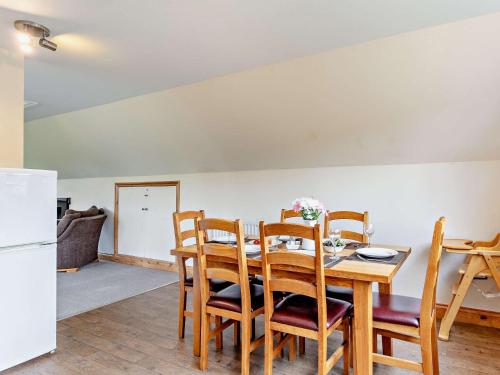 a kitchen and dining room with a table and chairs at 3 Bed in Crediton WAIE4 in Zeal Monachorum
