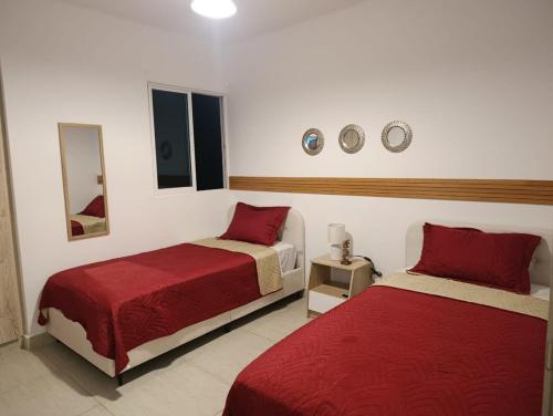 Postel nebo postele na pokoji v ubytování Your Apartment in Playa Blanca Resort