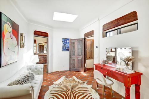 a living room with a table and a couch at Luxury 5 bedroom Wine Retreat Fallbrook Villa sleeps 12 in Fallbrook