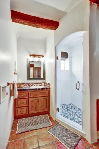 a bathroom with a shower with a glass door at Luxury 5 bedroom Wine Retreat Fallbrook Villa sleeps 12 in Fallbrook