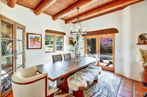 a dining room with a wooden table and chairs at Luxury 5 bedroom Wine Retreat Fallbrook Villa sleeps 12 in Fallbrook
