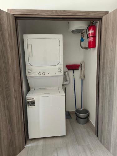 Una cocina o cocineta en Apartamento Cómodo en Punta Cana