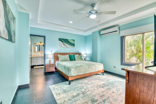 a bedroom with a bed and a ceiling fan at Castillo Colonial Nosara - by Pura Villas in Nosara