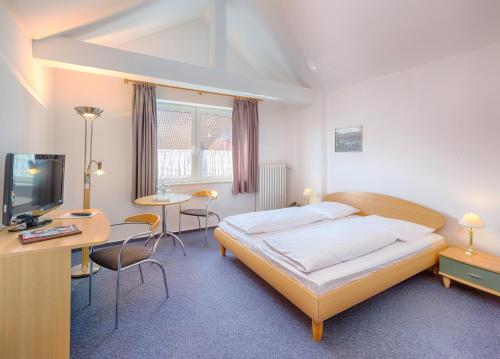 Postel nebo postele na pokoji v ubytování Hotel zur Börse