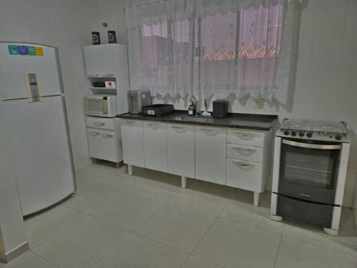 Η κουζίνα ή μικρή κουζίνα στο Apartamento da Dani