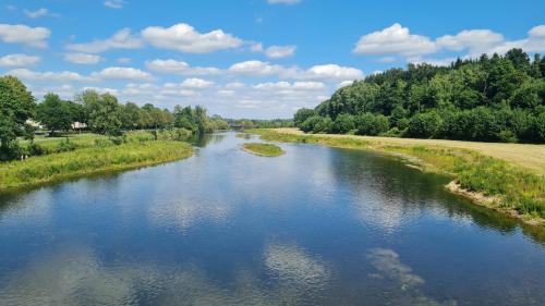 a view of a river from a bridge at Neues Ruhrtal Apartment 5 mit Klimaanlage in Wickede (Ruhr)