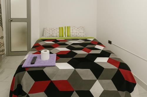 Postel nebo postele na pokoji v ubytování hostal kactus