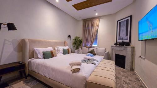 En eller flere senge i et værelse på Downtown Gem - Central Rabat apartment in a 1910 Building