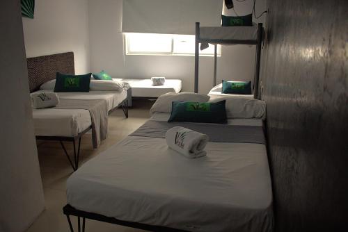 Letto o letti in una camera di Hotel Vesta Boutique