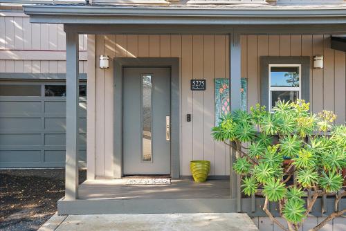 a front door of a house with plants at Pembrook Paradise Monthly Rental Only in Cambria