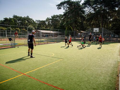 a group of people playing soccer on a court at Veldzicht in Bocholt