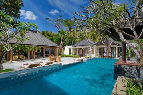 an image of a swimming pool in a villa at Amarterra Villas Resort Bali Nusa Dua, Autograph Collection in Nusa Dua
