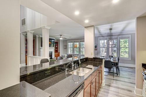 a kitchen with a sink and a counter top at Lake Oconee Condo in Greensboro