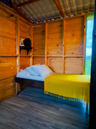 Postel nebo postele na pokoji v ubytování Cabaña Rustica Durango