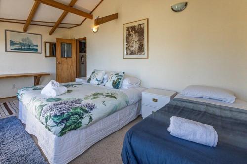 Postel nebo postele na pokoji v ubytování Kaha Lodge