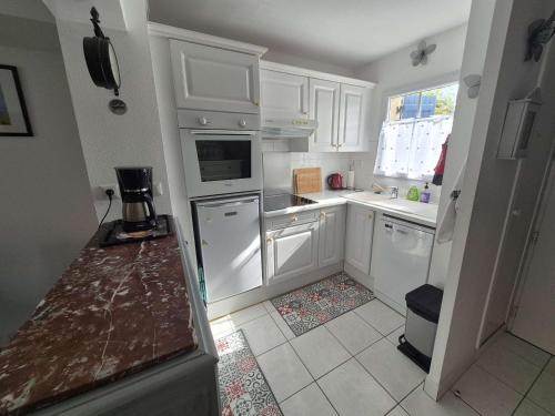 Photo de la galerie de l'établissement Charmante maison avec jardin à Merlimont, 5 couchages - FR-1-672-40, à Merlimont