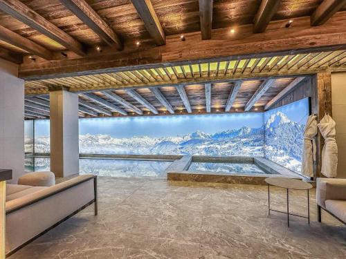 Photo de la galerie de l'établissement Chalet Courchevel 1850, 14 pers, Jacuzzi et sauna, Parking - FR-1-564-133, à Courchevel