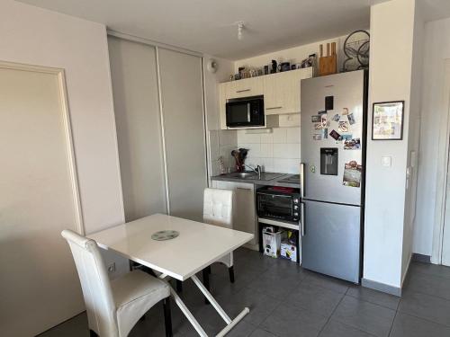 Appartement Perpignan tesisinde mutfak veya mini mutfak