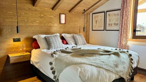 Katil atau katil-katil dalam bilik di Luxury Penthouse With Mont Blanc Views In Megève