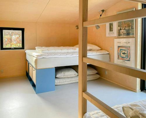 Holiday Home With View Of Helnæs Bayにあるベッド
