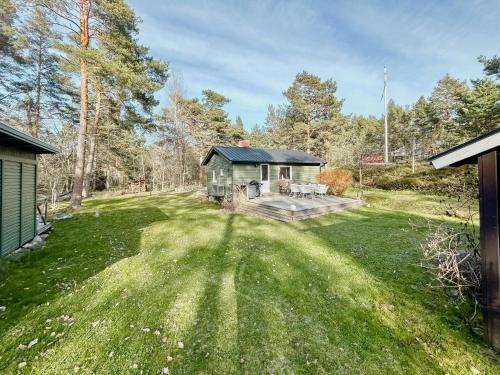 an aerial view of a house in a yard at Archipelago With Dock Close To The Sea in Nämdö