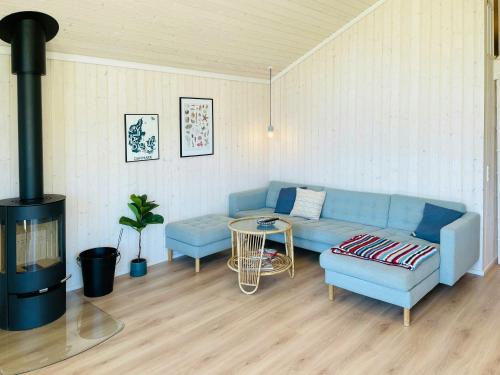 Posezení v ubytování Classic Cottage Near Forest And Beach In Grenaa