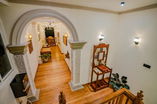 an open hallway with an archway in a house at Fin Mirissa by Morning star in Mirissa