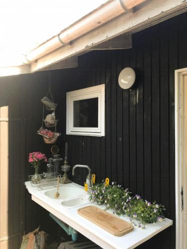 Μια τηλεόραση ή/και κέντρο ψυχαγωγίας στο Nordic Haven For Families At Guest Houses