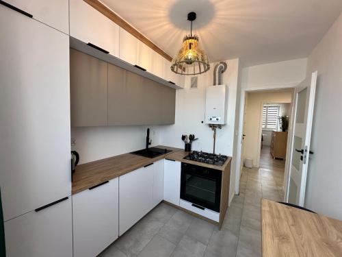 Η κουζίνα ή μικρή κουζίνα στο Modern apartament