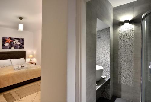 Koupelna v ubytování Hotel Nazos 1
