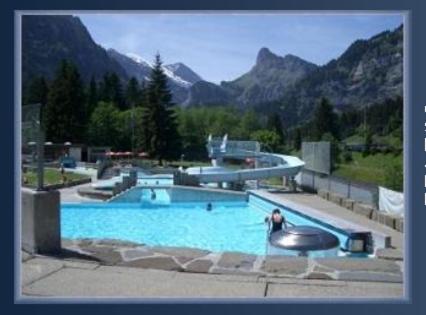 a person is standing in a swimming pool at Hotel Altels in Kandergrund
