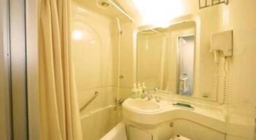 Ванная комната в Hotel Route Inn Hirosaki Ekimae