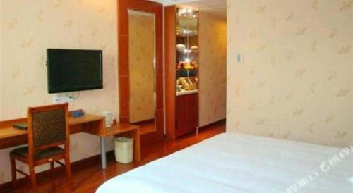 TV o dispositivi per l'intrattenimento presso GreenTree Inn Changshu South HaiYu Road Pedestrian Street Business Hotel