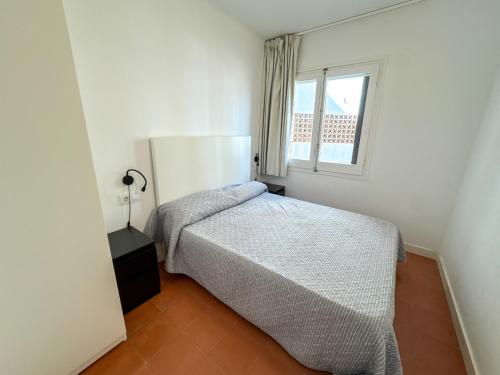 A bed or beds in a room at RHODAS 16