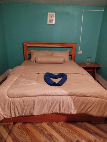 Postel nebo postele na pokoji v ubytování Skipper House