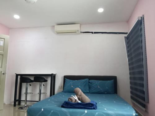 Ein Bett oder Betten in einem Zimmer der Unterkunft JSW PRAMLee Georgetown Penang