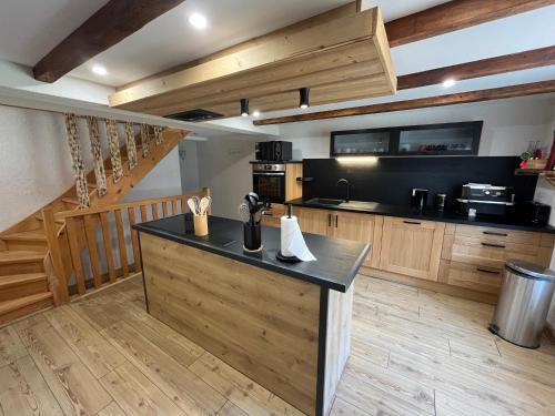 Kuchyň nebo kuchyňský kout v ubytování Le Moulin