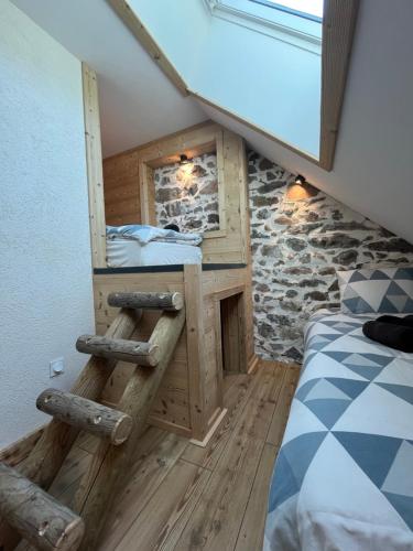 Postel nebo postele na pokoji v ubytování Le Moulin