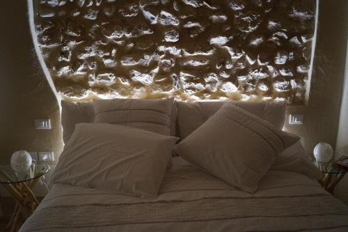 Letto o letti in una camera di Casa Daisy