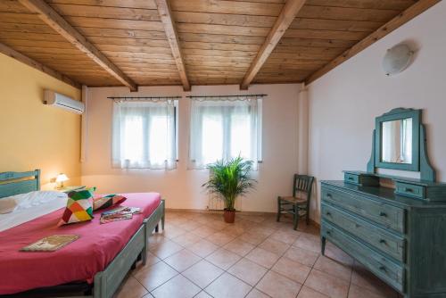 Postel nebo postele na pokoji v ubytování Camping Village Il Poggetto