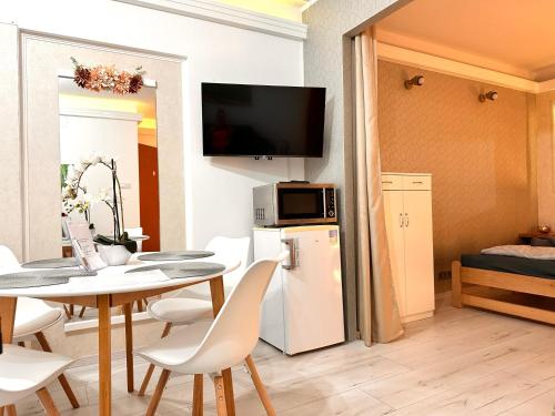 Et tv og/eller underholdning på Hello Holiday Apartman