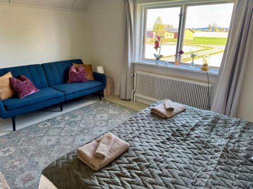 Ένα ή περισσότερα κρεβάτια σε δωμάτιο στο Cosy Home with River Views, Sauna & Gym